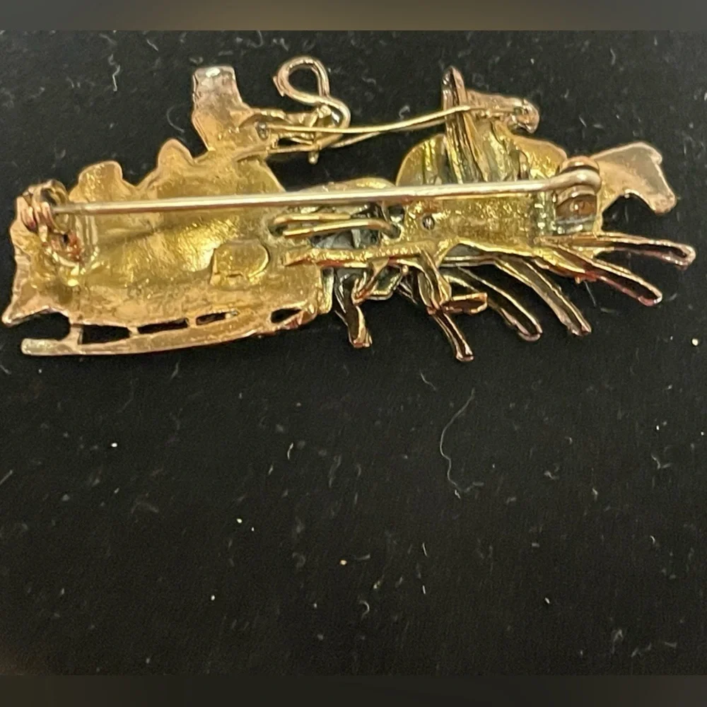 Reproduction of antique Russian Troika brooch